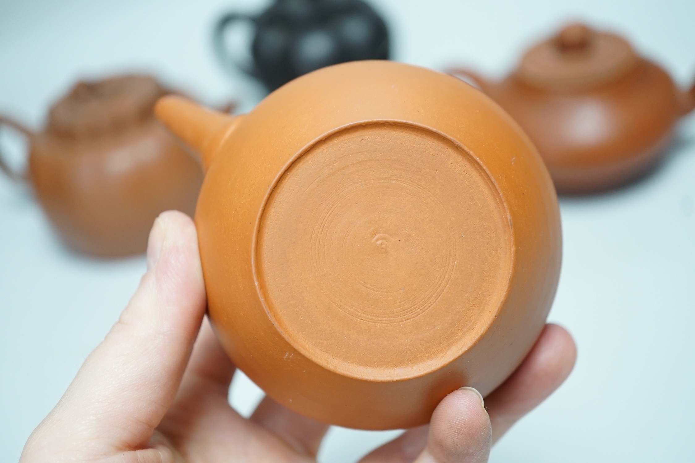 Four Chinese Yixing pottery teapots, tallest 10cm